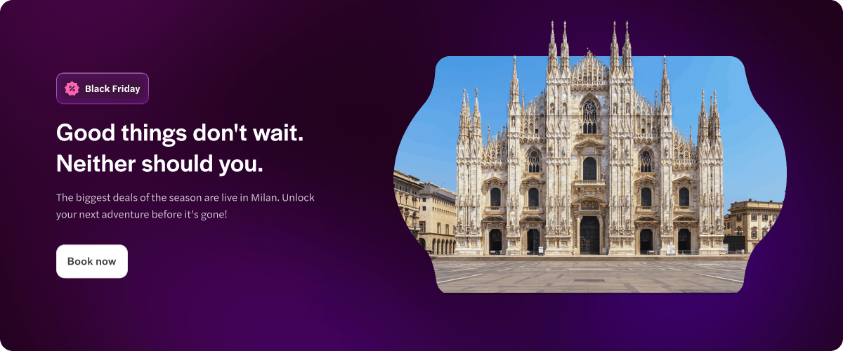 Milano Duomo Cathedral facade in Milan, Italy, with clear blue sky.